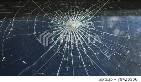Broken glass over natural black background. Broken glass over natural black background. 79420506
