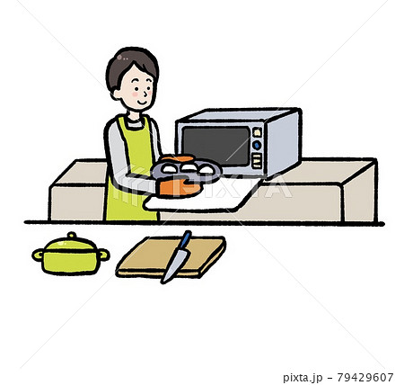 自炊をする一人暮らしの男性のイラストのイラスト素材