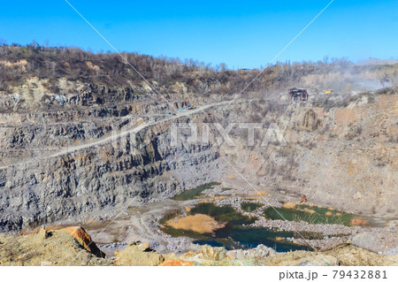 View of granite quarry. Pumping groundwater from quarry View of granite quarry. Pumping groundwater from quarry 79432881