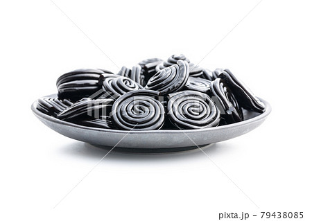Spiral from liquorice candy. 79438085