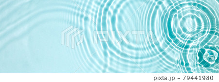 Blue water texture, blue mint water surface with rings and ripples. Spa concept background. Flat lay, copy space. Blue water texture, blue mint water surface with rings and ripples. Spa concept background. Flat lay, copy space. 79441980