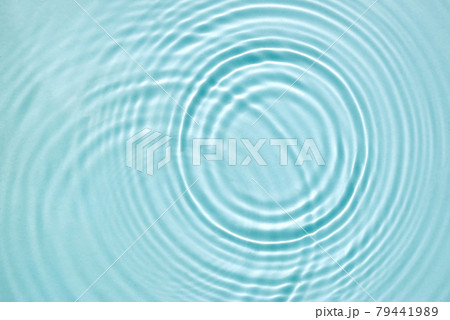 Blue water texture, blue mint water surface with rings and ripples. Spa concept background. Flat lay, copy space. Blue water texture, blue mint water surface with rings and ripples. Spa concept background. Flat lay, copy space. 79441989