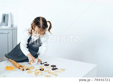 Children cooking sweet cookies on white table together, flat lay 79443721