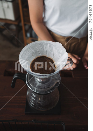 barista dripping coffee and slow coffee bar style barista dripping coffee and slow coffee bar style 79447673