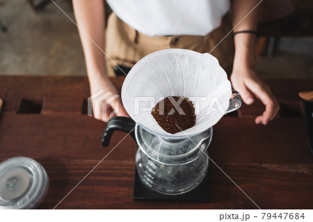 barista dripping coffee and slow coffee bar style 79447684
