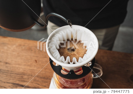 barista dripping coffee and slow coffee bar style barista dripping coffee and slow coffee bar style 79447775
