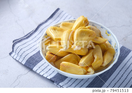 top view of slice of jackfruits in a bowl on table. 79451513