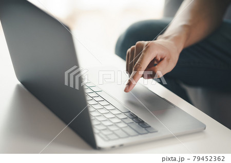 Man using a laptop computer to Searching for information, Web browser, Data Search, Search Engine, Technology Concept. Man using a laptop computer to Searching for information, Web browser, Data Search, Search Engine, Technology Concept. 79452362