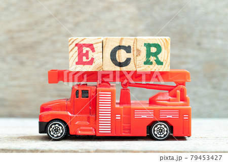 Fire ladder truck hold letter block in word ECR (Abbreviation of Efficient Consumer Response, Early Career Researcher, Engine control room) on wood background Fire ladder truck hold letter block in word ECR (Abbreviation of Efficient Consumer Response, Early Career Researcher, Engine control room) on wood background 79453427