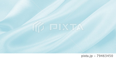 Smooth elegant blue silk or satin luxury cloth texture as abstract background. Luxurious background design Smooth elegant blue silk or satin luxury cloth texture as abstract background. Luxurious background design 79463450