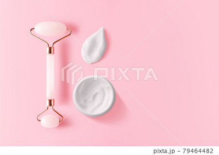 Quartz facial massager, moisturizer cream smear and jar on pink background with copy space, top view. Trendy skin care facial massager tools 3d vector realistic illustration Quartz facial massager, moisturizer cream smear and jar on pink background with copy space, top view. Trendy skin care facial massager tools 3d vector realistic illustration 79464482