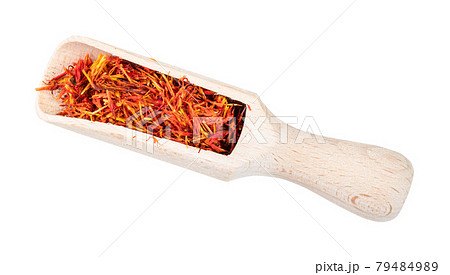 dried safflower petals in wood scoop cutout dried safflower petals in wood scoop cutout 79484989
