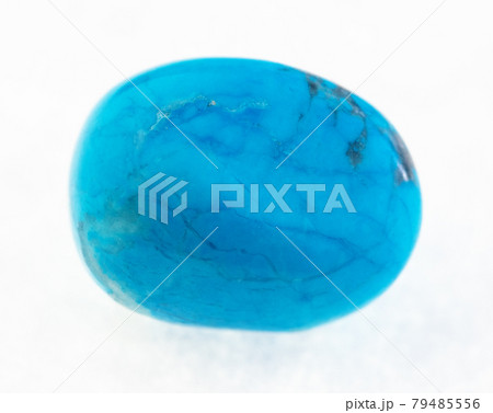 polished blue howlite (turquenite) stone on white polished blue howlite (turquenite) stone on white 79485556