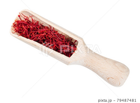 saffron threads in wood scoop cutout 79487481