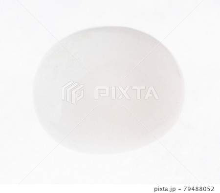 tumbled milky quartz gemstone on white 79488052