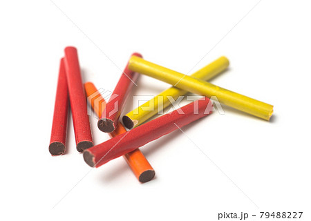 Closeup of chocolate cigarettes on white background 79488227