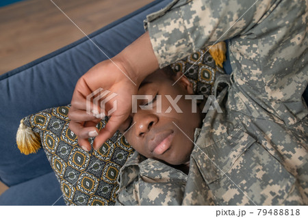 Face of young military sleeping in home Face of young military sleeping in home 79488818