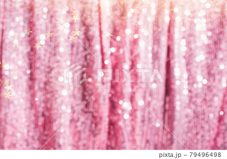 Fantastic background glitters pink curtain made of luxurious lurex sequins. Festive podium for party or Christmas. Fantastic background glitters pink curtain made of luxurious lurex sequins. Festive podium for party or Christmas. 79496498