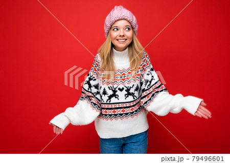 Beautiful positive happy young blonde woman isolated over colourful background wall wearing casual Beautiful positive happy young blonde woman isolated over colourful background wall wearing casual 79496601