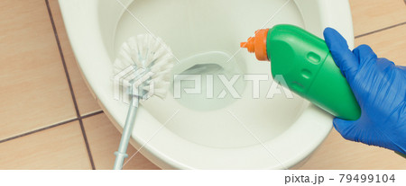 Domestic detergent and accessories for cleaning toilet. Household duties concept Domestic detergent and accessories for cleaning toilet. Household duties concept 79499104