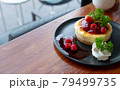Homemade cheesecake with fresh berries and mint for dessert - healthy organic summer dessert pie cheesecake 79499735