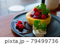 Homemade cheesecake with fresh berries and mint for dessert - healthy organic summer dessert pie cheesecake 79499736