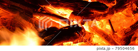 Campfire with hot coals, burning campfire, wood burning 79504656
