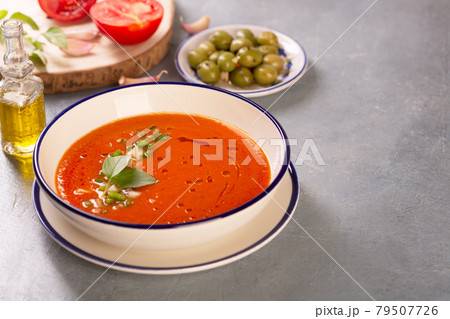 A plate of traditional spanish gazpacho in the background ingredients A plate of traditional spanish gazpacho in the background ingredients 79507726