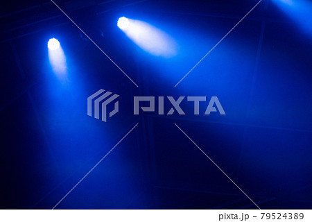 Blue stage lights glowing in the dark Blue stage lights glowing in the dark 79524389