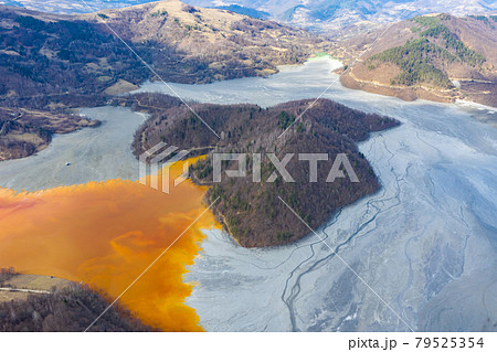 Aerial view of a lake filled with chemical waste water Aerial view of a lake filled with chemical waste water 79525354