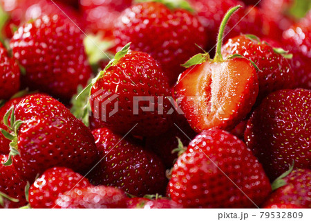 Strawberry ripe background, a lot of Fresh red berries, Close up the half of strawberries, Top view, High resolution product. Healthy organic fresh product. 79532809