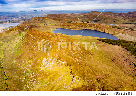 Aerial view of Lough Na Lughraman seen from Slieve Tooey in County Donegal - Ireland 79533383