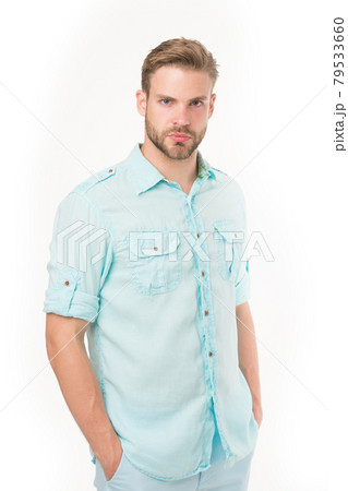Fashion man hold hands in pockets isolated on white background.  79533660