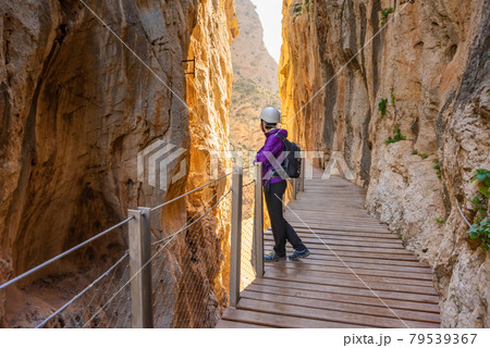 tourist woman in El Caminito del Rey tourist attraction Malaga, Spain 79539367