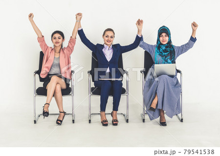 Happy young businesswomen celebrating success. Happy young businesswomen celebrating success. 79541538