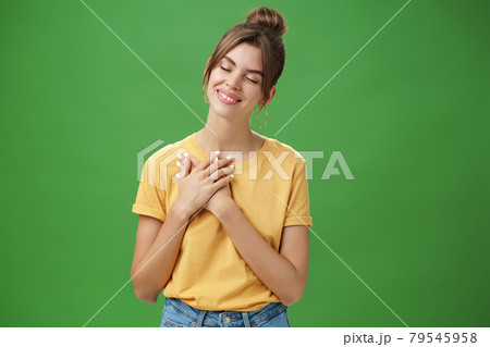 Happy kind and timid young attractive woman - Stock Photo [79545958] -  PIXTA