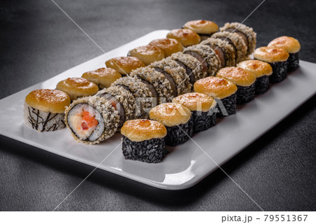 Delicious fresh rolls in various sets. Japanese food with avocado, shrimp, crab and salmon Delicious fresh rolls in various sets. Japanese food with avocado, shrimp, crab and salmon 79551367