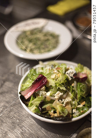 Andive salad with blue cheese and almonds Andive salad with blue cheese and almonds 79551457