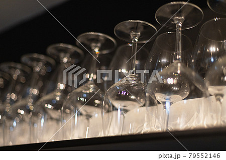 empty glasses on a dark background 79552146