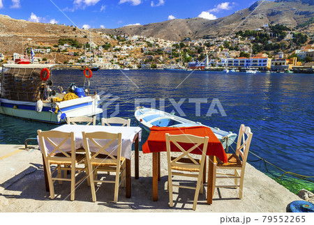 Traditional fish taverns (restaurants) in Greece Simi (Symi) island in Dodecanese Traditional fish taverns (restaurants) in Greece Simi (Symi) island in Dodecanese 79552265