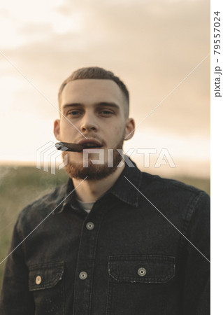 Man cowboy western car red light sunset summer 79557024