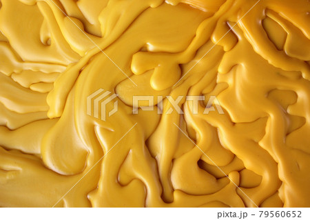 yellow candle drippings as background 79560652