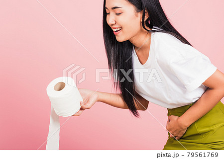 woman diarrhea constipation holding stomachache and tissue toilet paper 79561769