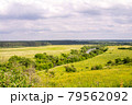 Spacious fields around the river hot summer 79562092