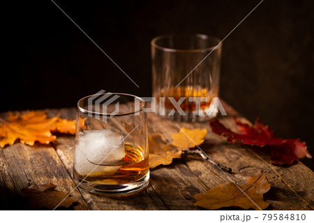 Glass of scotch whiskey 79584810