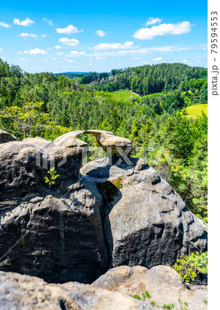 Unique sandstone arch on sunny summer day 79594553