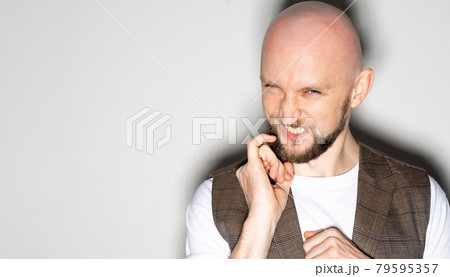 scheming man sneering face sneaky sly devious scheming man sneering face sneaky sly devious 79595357
