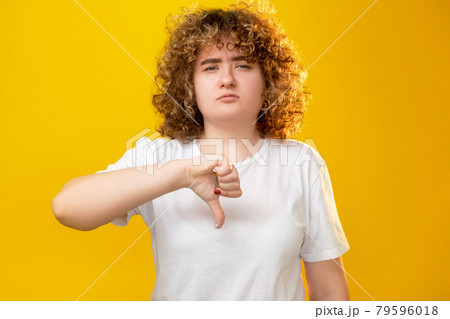 dislike gesture obesity shaming overweight woman dislike gesture obesity shaming overweight woman 79596018