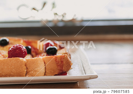 Dessert of toast bread with cherry and berry. Dessert of toast bread with cherry and berry. 79607585