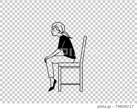 Woman sitting leaning forward with her toes up-black 79609217